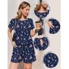 image:imageEkouaer Womens Romper 2026 Summer Casual Short Jumpsuits Beach Vacation Clothes with PocketsFloral Navy Blue