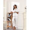 image:imageEkouaer Silk Pajamas for Women Satin Short Sleeve Pajamas Set with Ruffle 2 Pieces Button Down Tops and PantsWhite