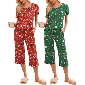 image:imageEkouaer 2 Pack Womens Pajamas Set Short Sleeve Sleepwear Capri Pants Pjs Soft Loungewear with PocketsChristmas Red SnowmanGreen Santa Claus