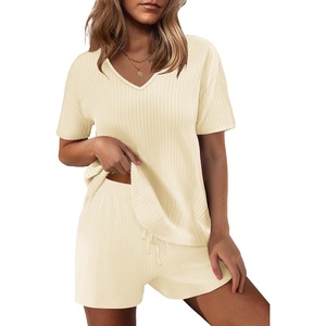 image:imageEkouaer Womens 2 Piece Lounge Sets Summer Two Piece Outfits Ribbed Knit V Neck Short Sleeve Tee and Pockets Shorts SetsBeige