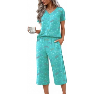 image:imageEkouaer Womens Pajama Sets Short Sleeve Sleepwear Button Up Pj Loungewear Top and Capri Pants with PocketsLight Blue Butterfly