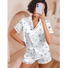 image:imageEkouaer Womens Silk Pajama Sets Button Up Satin Pjs Short Sleeve 2 Piece Pj Sets Cute Lounge Sets with Chest PocketWhite Shells