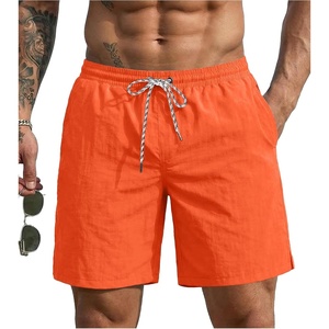 image:imageEkouaer Mens Swim Trunks 7 Quick Dry Board Shorts Swimwear Bathing Suit with Mesh Liner 2 in 1 Swimming Short with PocketsOrange