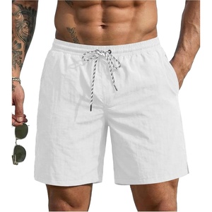 image:imageEkouaer Mens Swim Trunks 7 Quick Dry Board Shorts Swimwear Bathing Suit with Mesh Liner 2 in 1 Swimming Short with PocketsWhite
