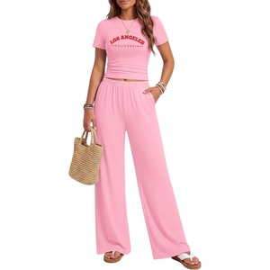 image:imageEkouaer Lounge Sets for Women 2 Piece Summer Matching Set with Pockets  Vacation Airport Travel OutfitsSoft Stretch LoungewearSlim Short Sleeve Graphic Top and PantsComfy Casual ClothesPinkletter