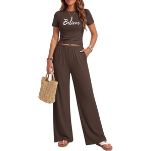 image:imageEkouaer Lounge Sets for Women 2 Piece Summer Matching Set with Pockets  Vacation Airport Travel OutfitsSoft Stretch LoungewearSlim Short Sleeve Graphic Top and PantsComfy Casual ClothesBrownletter